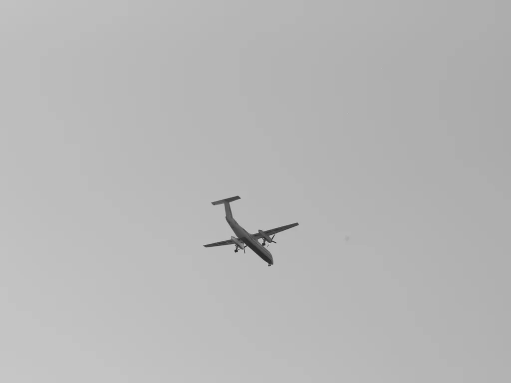 a propeller plane in the sky