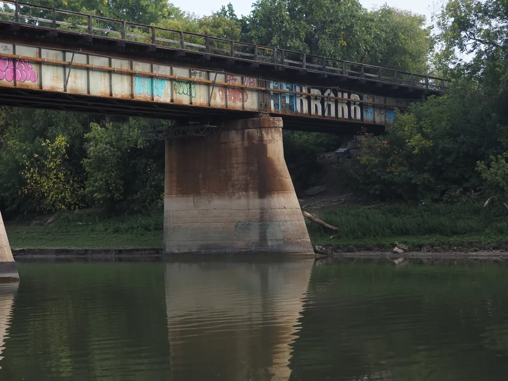 a rail bridge over a river