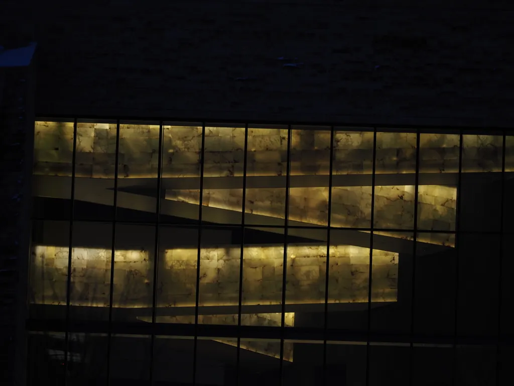 walkways in a museum lit up at night