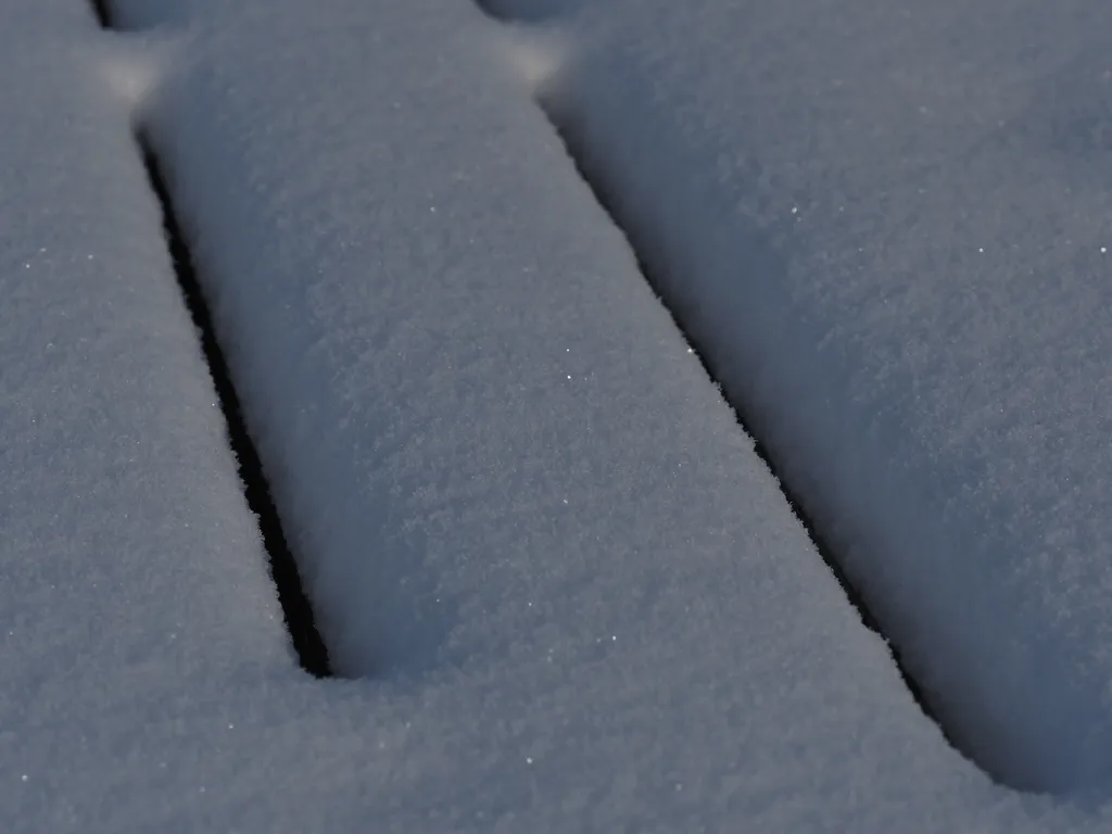 snow on a picnic table