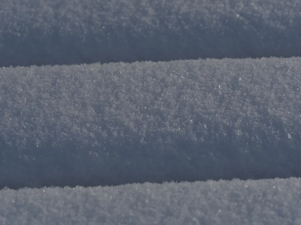 snow on a picnic table