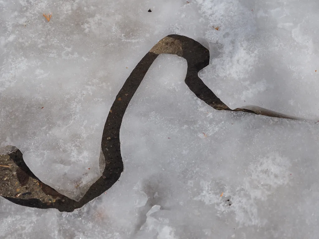 a winding ravine carved into the ice