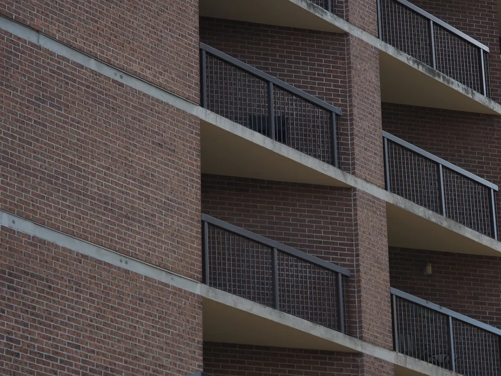 balconies on a brick building