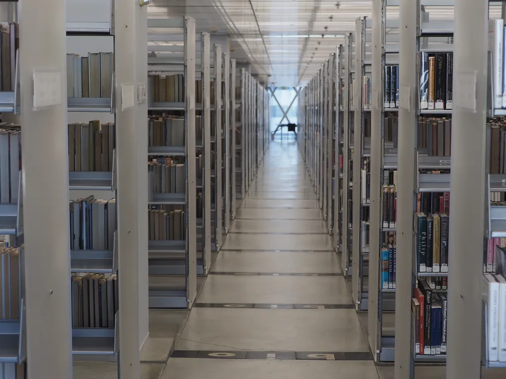 a long library stacks hallway