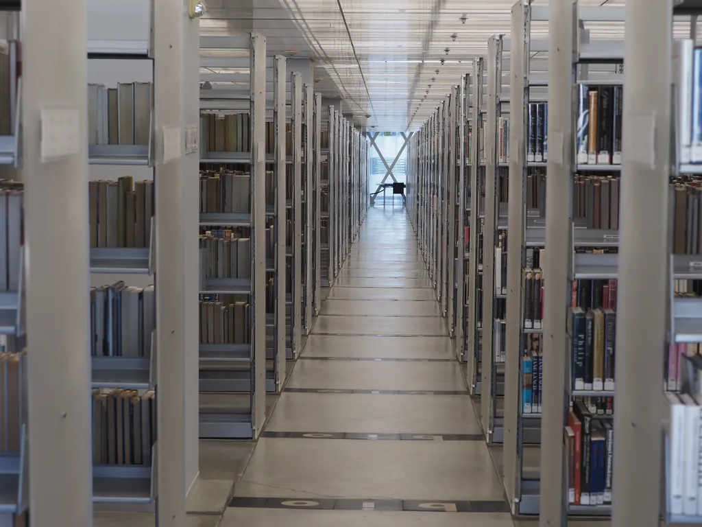 a long library stacks hallway