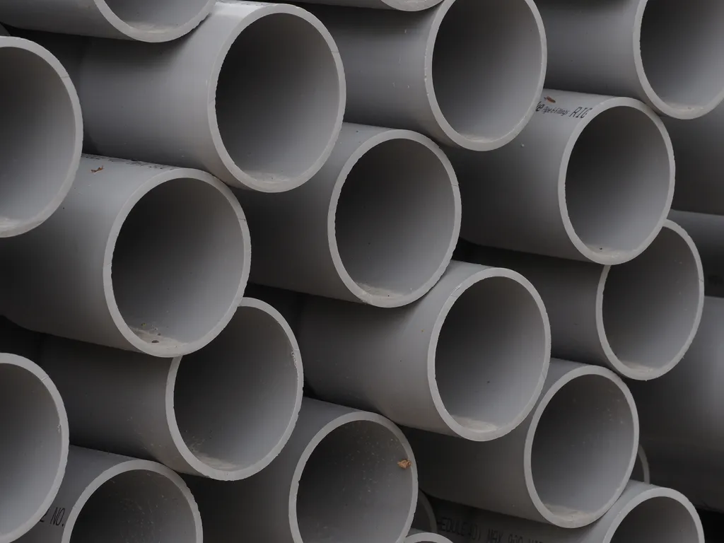 bundles of grey pvc pipe