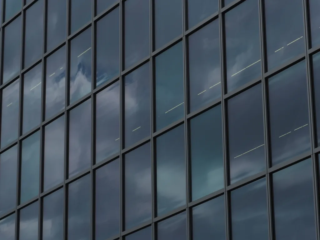 clouds reflected in glass windows