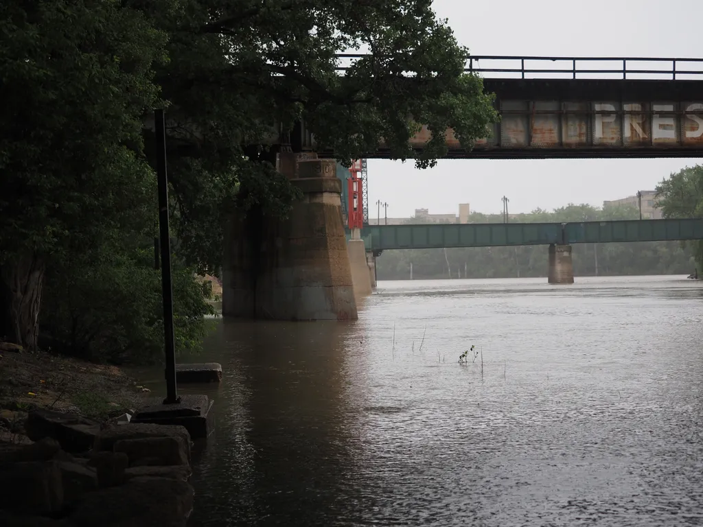 a flooded path in the rain