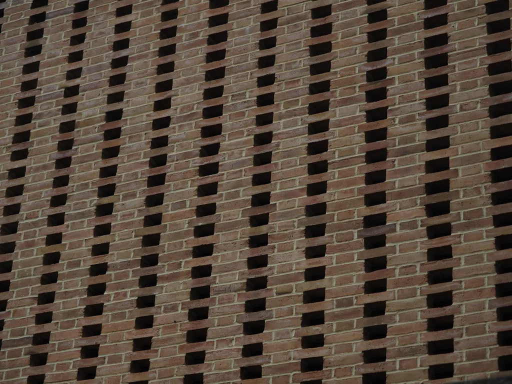 a patterned brick wall