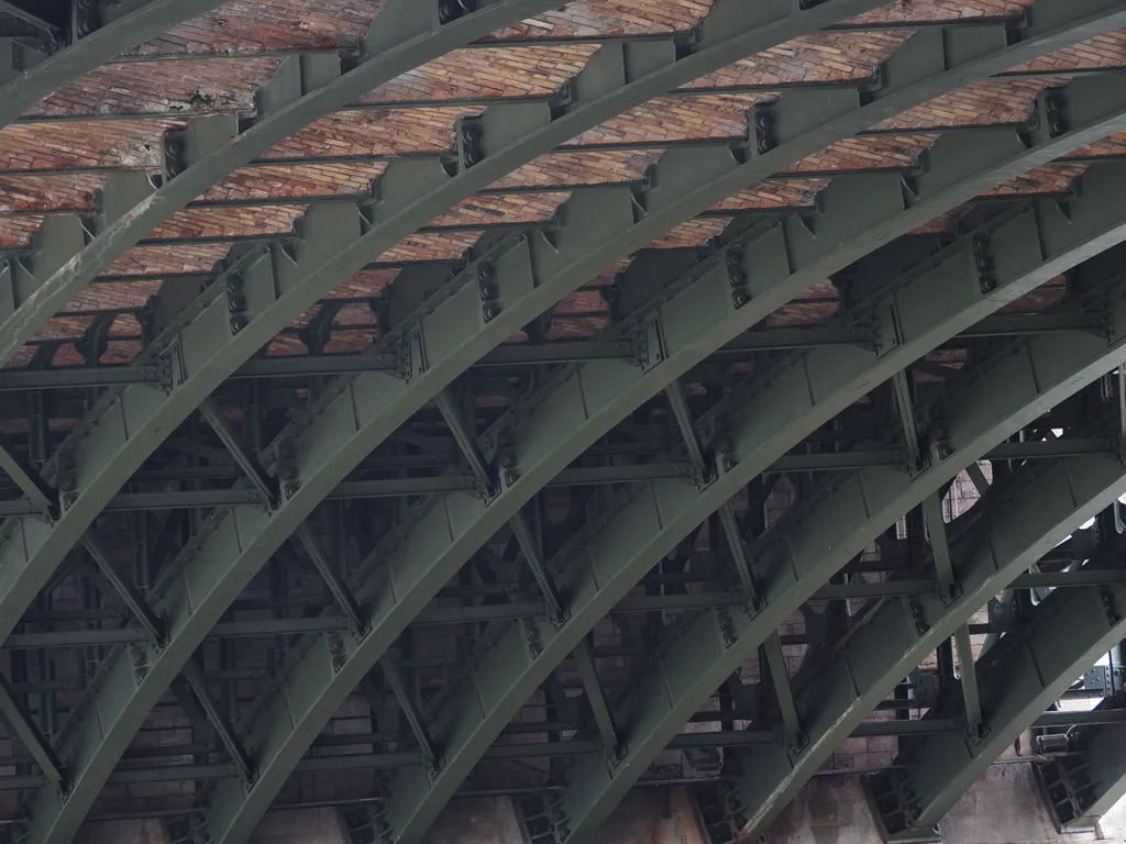 metal beams under a bridge