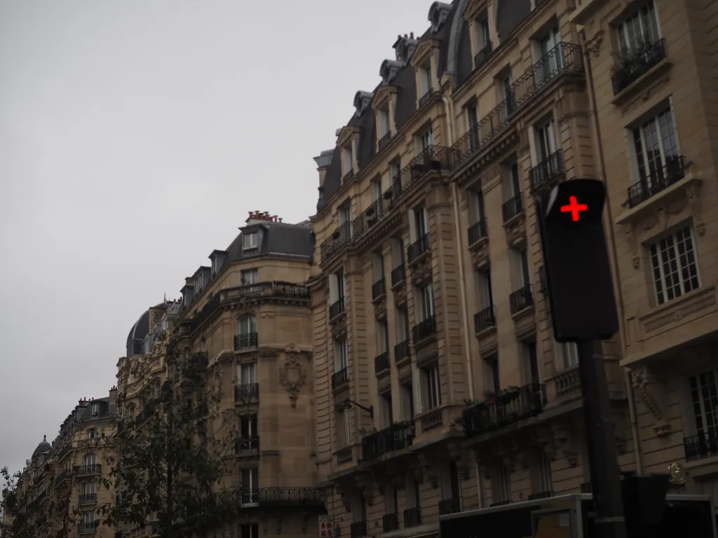 a traffic light displaying a red cross