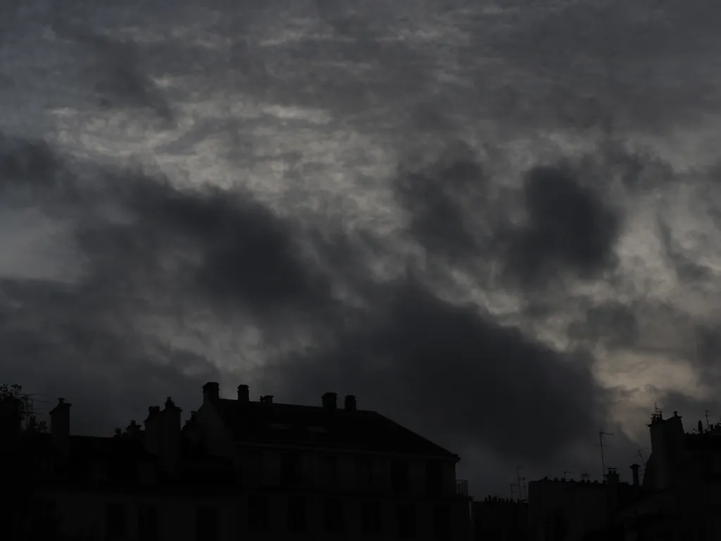 buildings against a cloudy sky