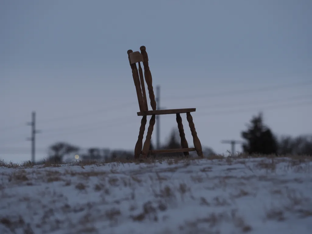 a chair sitting on a berm