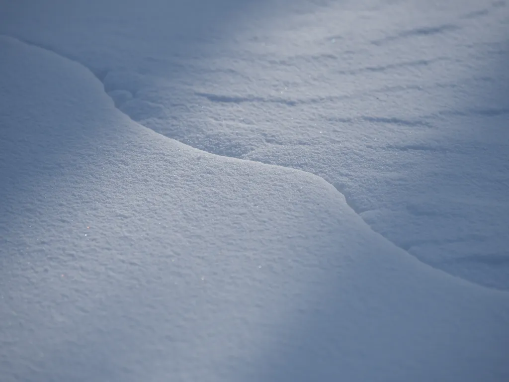 a seam running along the snow