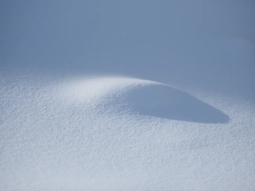 gentle mound in snow