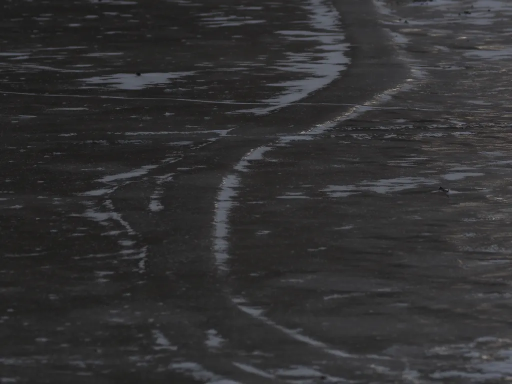 the frozen surface of a river