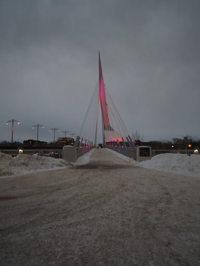 a bridge lit up by spotlights