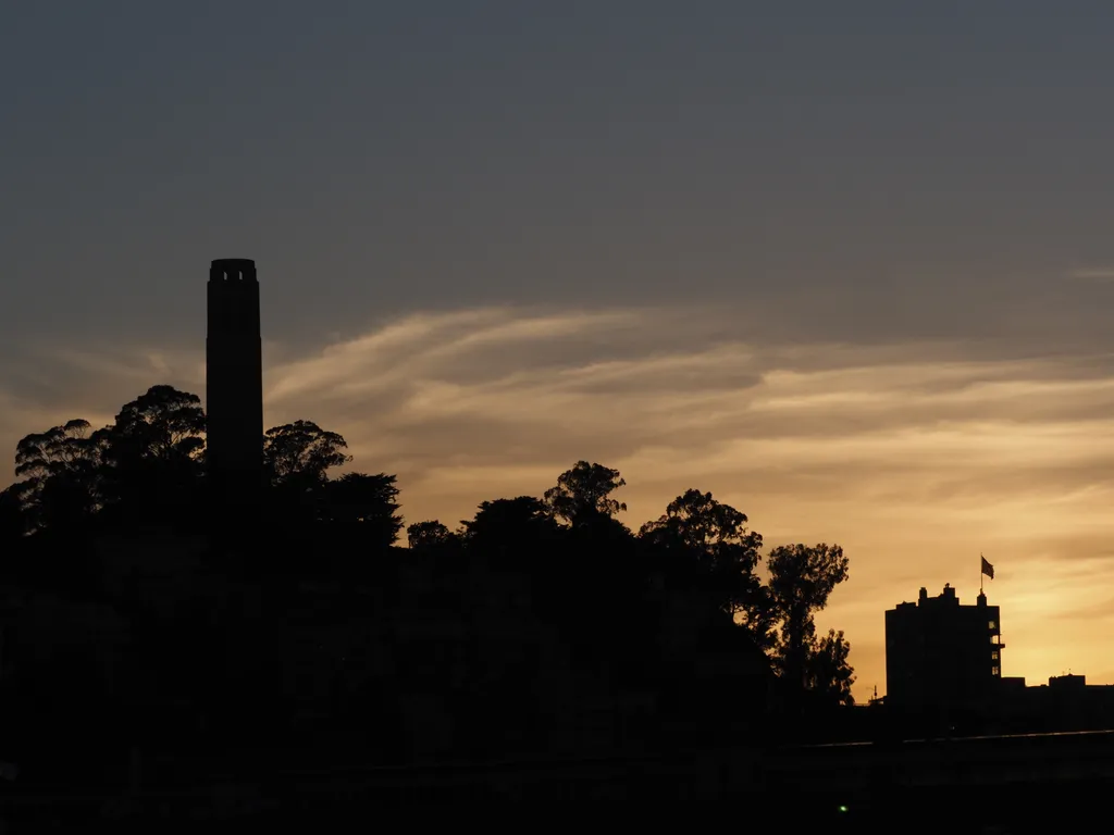 a tower at sunset