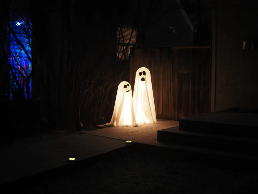 light-up ghosts on a front porch