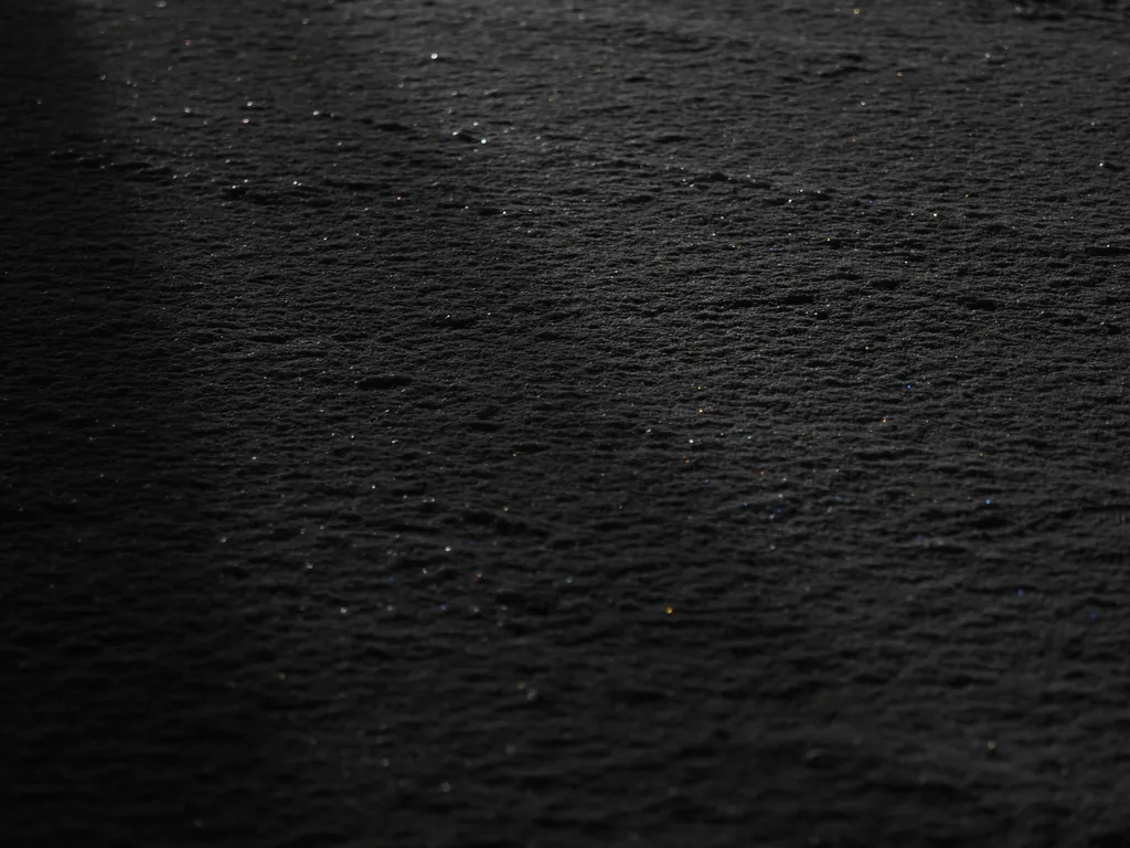 streetlights reflecting off snow