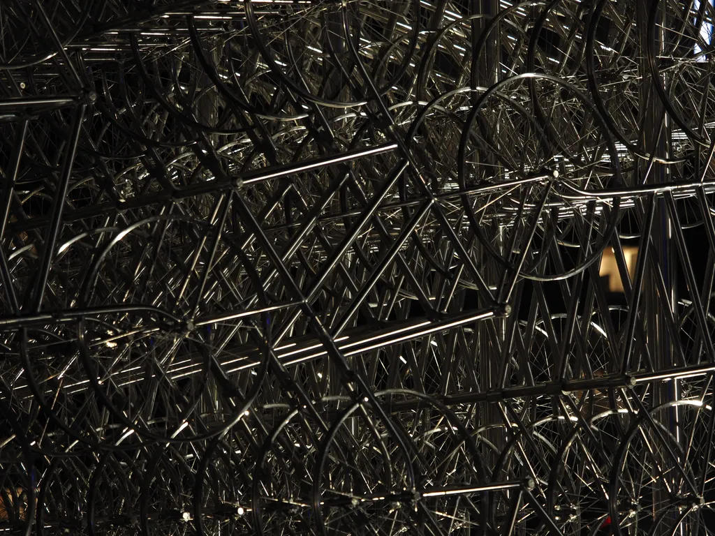 unpainted steel bicycles welded together