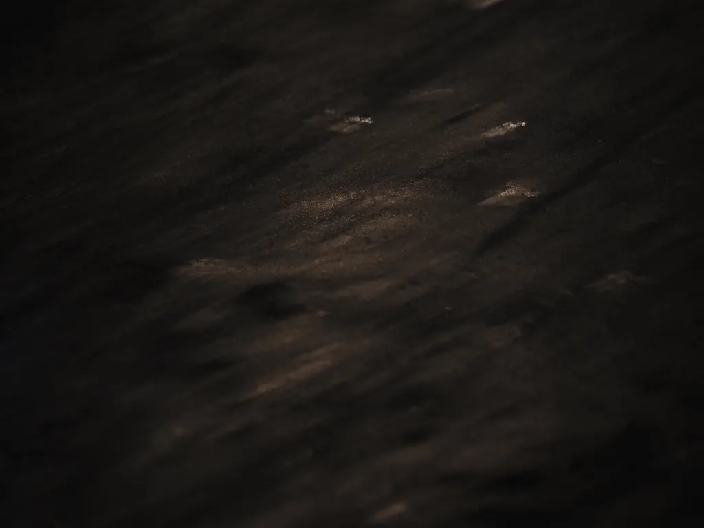 light reflecting on ice at night