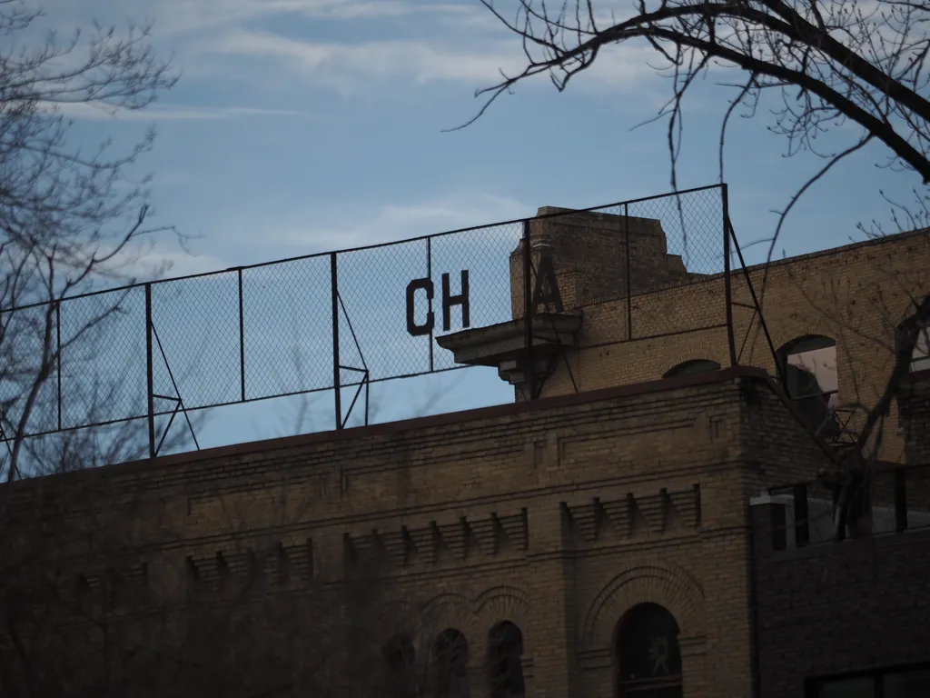 a sign on a building: CH A