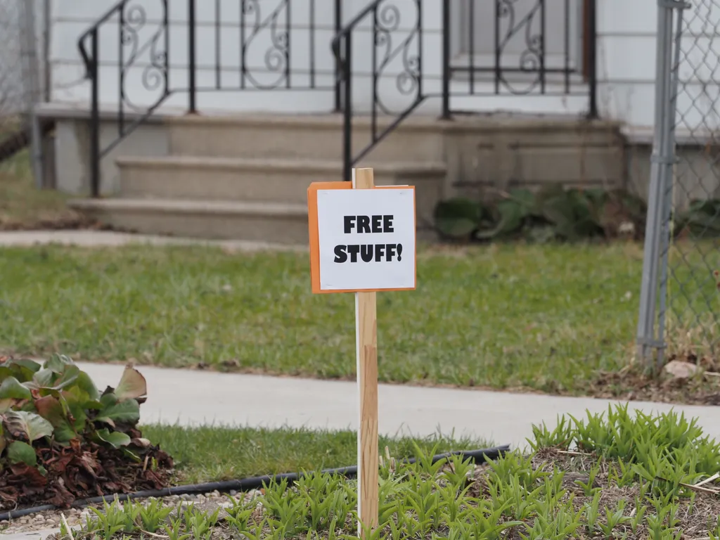 a sign with the text free stuff!