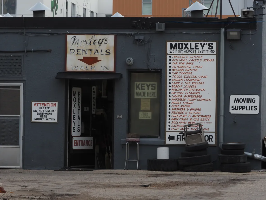a building with a faded sign