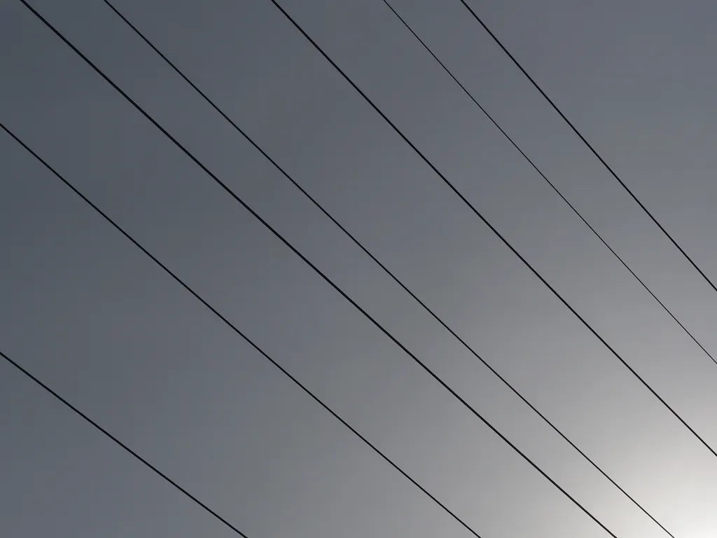 telephone whites going diagonally across the frame of a gray sky