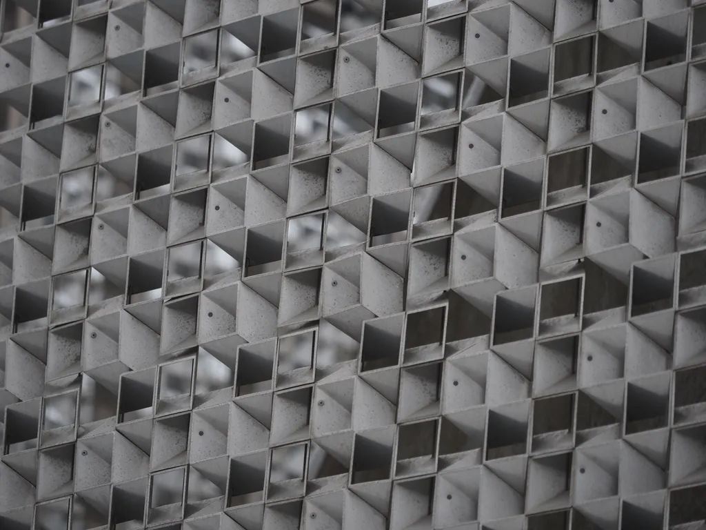 a metal curtain made of metal tubes with square ends