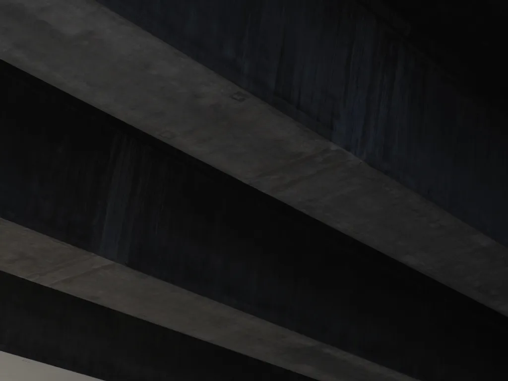 long concrete beams supporting a bridge