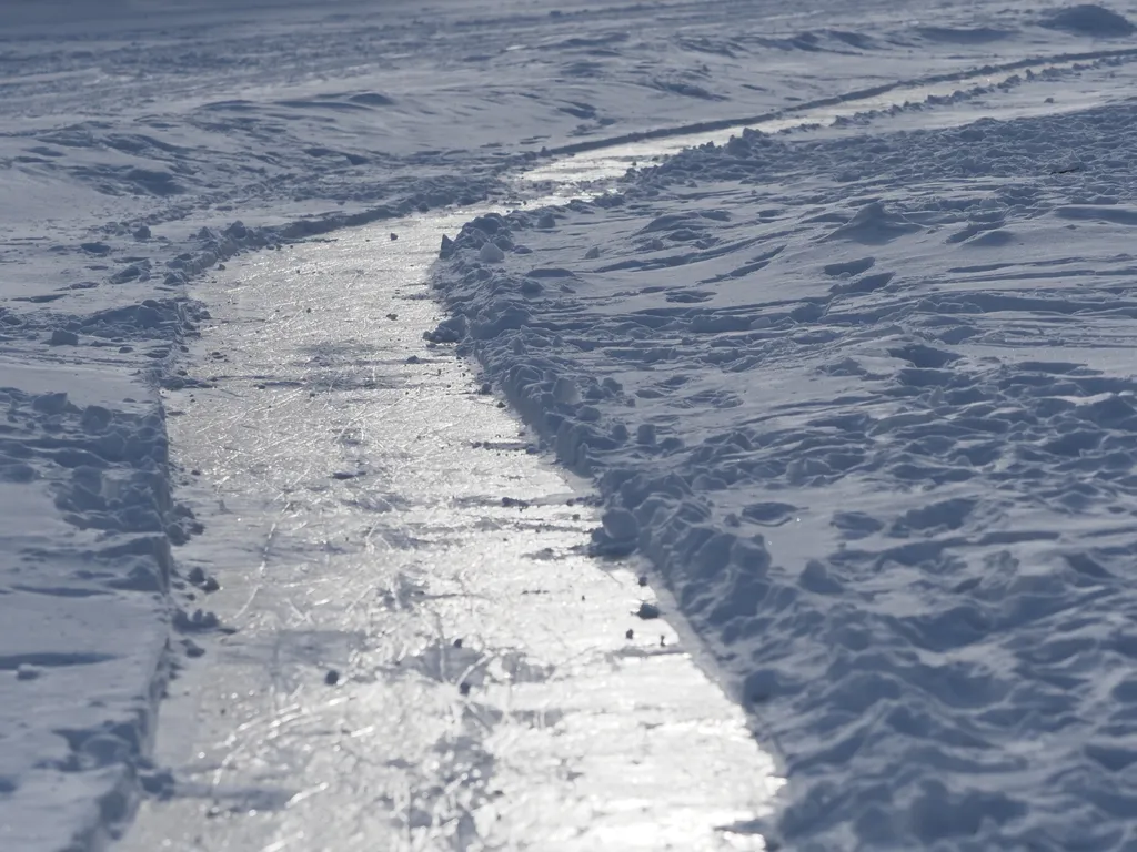 A shoveled ice path on a frozen river